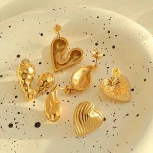 French style gold-plated heart and teardrop earrings set with unique textured metal finish