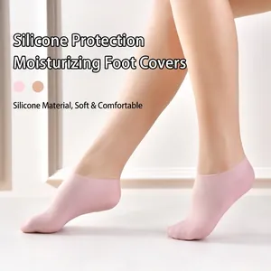 Soft pink silicone moisturizing socks for foot care and cracked heel repair
