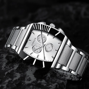Close-up of ZHPEER square chronograph watch with silver steel strap on a dark stone base