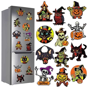 Detail of vintage Halloween magnets featuring skeletons and pumpkins on a fridge door