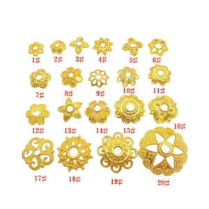 Detailed assortment of twenty golden hollow flower bead caps and petal spacers for DIY jewelry