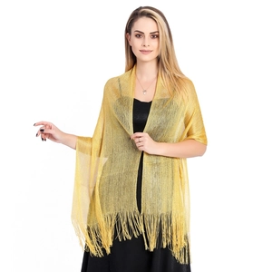Detailed close-up of a sparkling gold metallic shawl with elegant fringe tassels for evening gowns