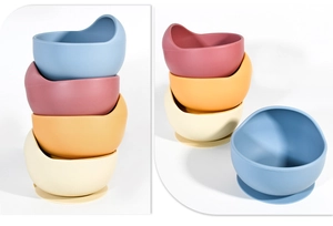 Detail showing colorful silicone baby suction bowls in blue, pink, and yellow colors