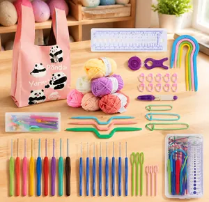 Complete knitting crochet kit with pink panda bag, colorful yarn, and ergonomic hooks