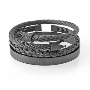 Macro view of black men's triple bracelet set with crown charm and Roman numerals