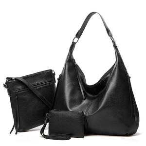Three-piece black soft leather tote set including shoulder bag, crossbody and clutch