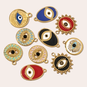 Collection of colorful evil eye pendants in gold-plated stainless steel with enamel