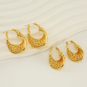 Close-up of gold stainless steel woven earrings in small and large sizes on a stand