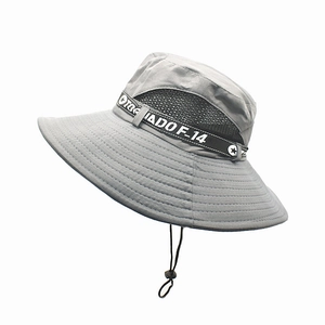 Detail of gray sun hat featuring breathable black mesh panels and Tornado F-14 print