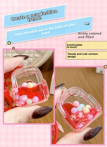 Detailed view of mini backpack liquid keychain with red floating glitters and sequins