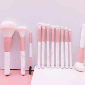 Professional 12pcs sky blue makeup brush set with marble handles and soft gradient bristles