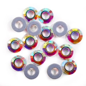 Macro detail of AB crystal rondelle spacer beads for DIY jewelry and nail art crafts