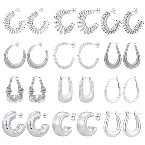 Set of 12 pairs vintage silver geometric hoop earrings in various textured metal designs