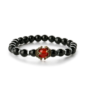 Men's retro beaded bracelet with black onyx, red center stone, and crown metal details