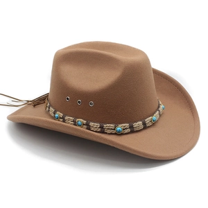 Detail of brown felt cowboy hat with ethnic turquoise beaded band and side tassels