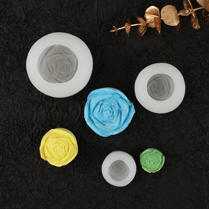 Detailed rose flower silicone molds with colorful 3D ice models on black background