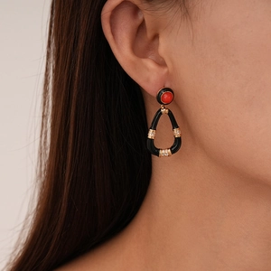 Retro black enamel and gold teardrop earrings with red bead and crystal accents