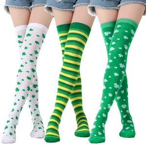 Detailed knit texture of St. Patrick's Day over-the-knee socks with clover and stripe patterns