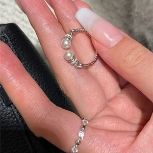 Elegant adjustable spiral open ring with white pearls and sparkling zircon stones