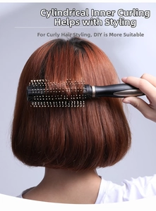Detail view of the round curling hair brush creating an inner buckle hairstyle for women