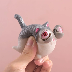 Funny grey cat squeeze toy with pop-out eyes for stress relief and sensory play