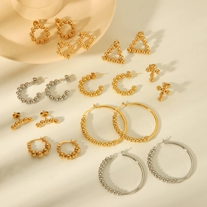 Set of gold and silver stainless steel earrings featuring geometric and bead designs