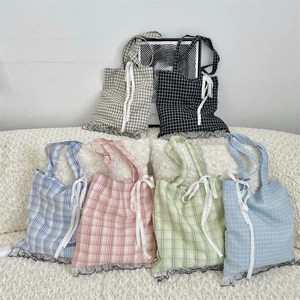 Collection of plaid canvas tote bags with delicate lace trim and ribbon bow details