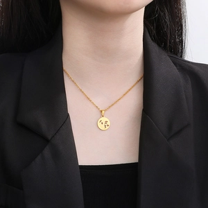 Elegant 18K gold plated necklace with a polished round kissing emoji face pendant