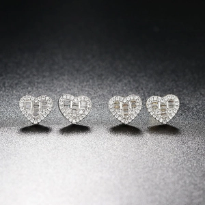 Elegant silver heart-shaped stud earrings with zircon inlay for a minimalist luxury look