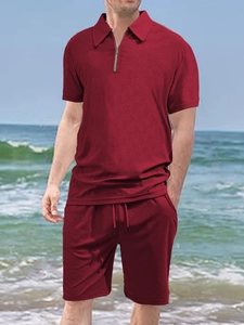 Detail view of men's burgundy waffle knit short sleeve polo and matching drawstring shorts