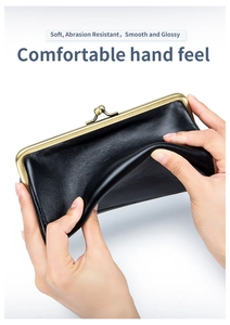 Detail showing the soft, abrasion resistant black leather texture and metal clasp closure