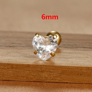 Macro view of a 6mm heart-shaped zircon stud earring with a gold screw back closure