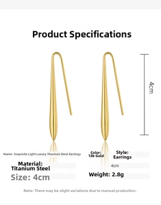 Detail view of gold stainless steel long bar earrings with size measurements