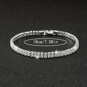 Detailed close-up of 18cm silver double-row tennis bracelet with sparkling zircon stones