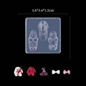 Detail view of transparent silicone nail art mold with rabbit and cherry shapes