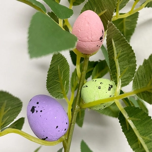 Artificial Easter egg floral stems with speckled foam eggs and green leaves for home decor