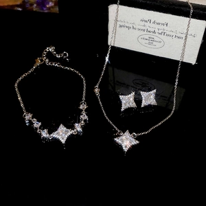 Detailed view of S925 sterling silver star jewelry set including necklace bracelet and earrings