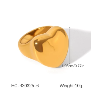 Detailed view of polished gold heart ring showing 1.96cm height and 10g weight