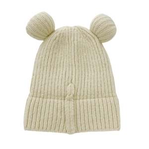 Macro detail of creamy white knitted beanie with cute plush ears and thick rib texture