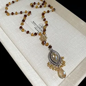 Vintage bohemian beaded necklace with amber crystal teardrop pendant in an elegant gift box
