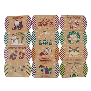 Set of 12 Christmas kraft paper pillow boxes with various festive holiday patterns