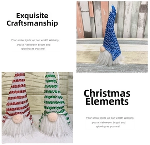 Detailed close-up of handmade Christmas gnomes with knit hats and long white fiber beards