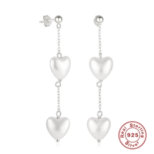 925 sterling silver long drop earrings featuring two interconnected heart charms on chains