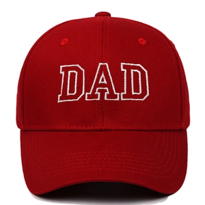Detailed close-up of vintage dark red baseball cap with white DAD embroidery