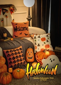 Detailed view of Halloween embroidered pillow covers with pumpkins and spooky bat designs