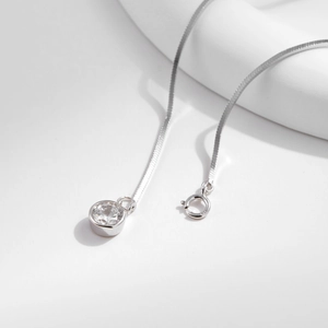 Elegant S925 sterling silver flat snake chain bracelet with a sparkling zircon pendant
