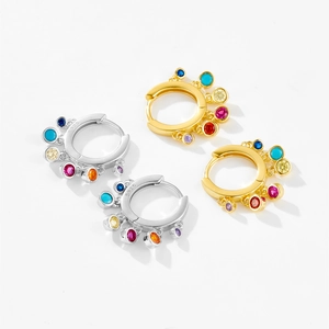 Macro view of S925 silver earrings with multicolored cubic zirconia gemstones