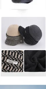 Detail of winter knitted hat showing soft fleece lining and premium metal logo tag