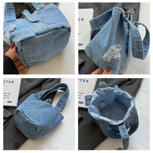 Chic light blue denim bucket bag with vintage distressed details and spacious interior