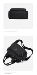 Macro detail of black nylon crossbody bag featuring multiple zippers and metal logo